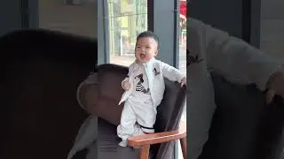 10 months old, doesn't like to crawl or sit, just wants to stand and play all day long.