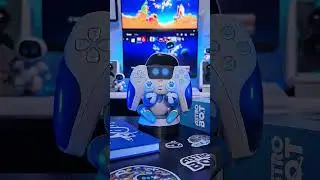Astrobot toy holding Astrobot ps5 controller