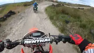 ELLIOTT SHARIFI falling with style cowm quarry on his Husqvarna TC50 MINI