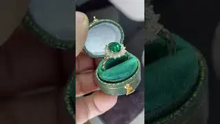 Oval Halo Emerald Engagement Ring.