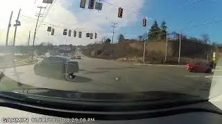 Vacation Dashcam #1:  Driver performs U-Turn in middle of Intersection.
