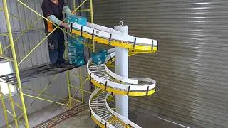 NEXUS Gravity Roller Spiral Conveyor - Carton Handling