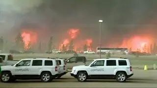 Oil workers evacuated as Fort McMurray wildfire spreads rapidly north