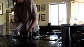 DJ Garbage - just me fooling around. DJ FISHBITS might be baby scratching. Is that a crab?