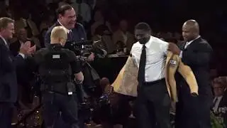 LaDainian Tomlinson gets his gold jacket from Lorenzo Neal