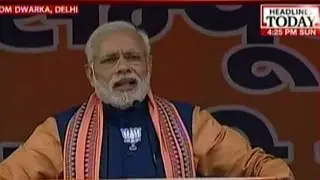 PM Modi addressing the rally at Dwarka