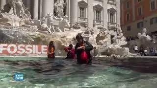 Climate activists have poured black dye into the historic Trevi Fountain, in Rome