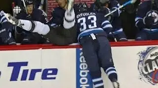 Byfuglien bulldozes Muzzin into the bench