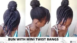 A BUN WITH MINI TWIST BANGS ON 4C NATURAL HAIR