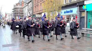 2025 City of Perth Remembrance Sunday parade led by Perth Pipe Band along Perth's High Street