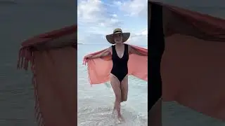 Beachside Bliss 🌊 Twirling in the SHU-SHI Coral Sarong!