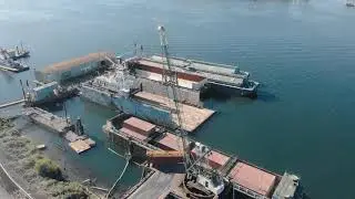 Loading Containers onto a Barge (Tons of Trash Virtual Tour)