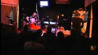 Terry Marsh playing a drum solo to John Cage.  media and live painter and drum solo