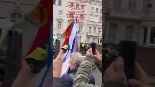 Iranians in London protest in front of the Iranian embassy on Sunday, January 11