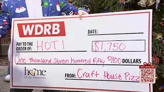 Craft House Pizza presents its donation check for Jude's Jingle Tree