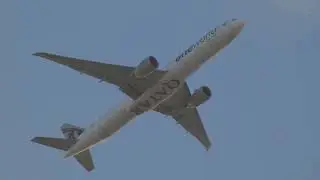 Qatar Airways Boeing 777 arriving from Doha, featuring the oneworld alliance livery