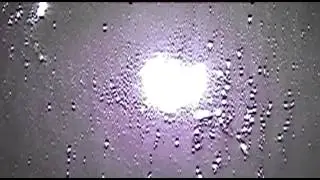 Slow Motion (300fps) Sunlight Reflection in Wet Sand Interference Fringes?