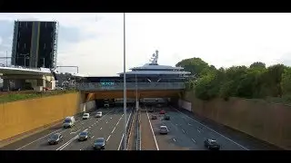 Feadship Lonian taking the Gouwe Aquaduct to pass the highway