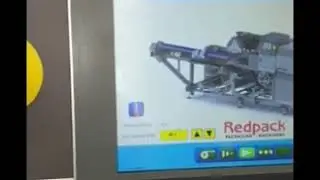 Redpack NTS-BMI flowrapping Iceberg Lettuces flow on a field rig at 80 heads per minute