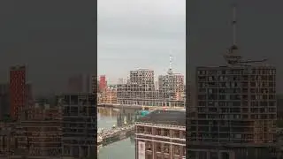 Aerial timelapse view over Maashaven with Katendrecht and Maas River. Netherlands