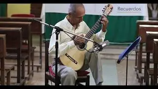 Recuerdos de Ernesto Bouvier playing a Paul Aguilera FE18 model guitar