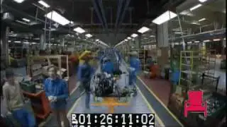 Time-lapse of factory assembly line workers