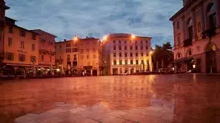 Rain on the empty Piazza Riforma late evening, relaxing sound of rain hitting the stone laid square.