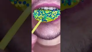 Lemon lollipop bold bite with a golden grin
