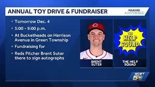 Cincinnati native Brent Suter assisting The Help Squad with holiday toy drive