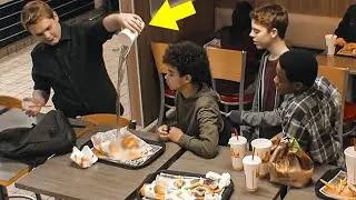 Teens Mock Poor Boy At BurgerKing, Don't Notice Man On Bench