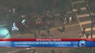 Norfolk police charge driver of red truck that sped toward protesters in Virginia Beach last month