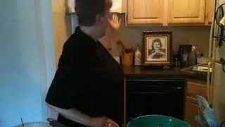 Making potato Latkes.
