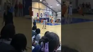 Karl 3 points long shoot again during final of Ireland basketball cup u15 championship in oblaite