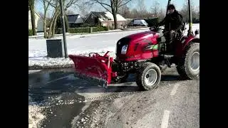 100% Electric Knegt Compact Tractor with snowplow