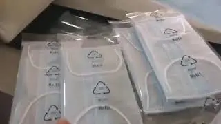 Automatic face mask flow wrapping packaging machine
