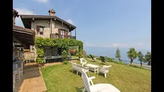 Villa singola in pietra con meravigliosa vista lago