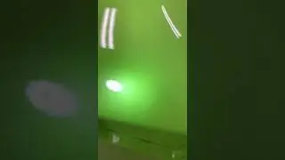Sublime green pearl paint under light.