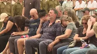 Funeral for Israeli soldier killed in explosion as troops searched suspect compound in Gaza Strip