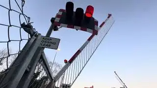 *fading LED and hangman* Hampton level crossing (london)