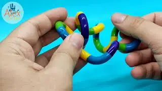 Demostrando el juguete sensorial Tangle Jr