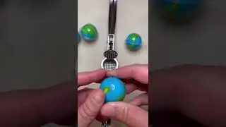 Crushing Gummy Candy with a Garlic Press - Earth Gummy Eye Gummy