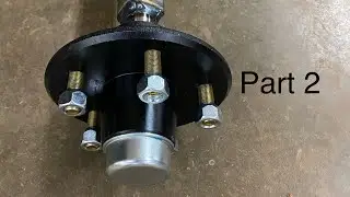 Jet ski trailer axle repair part 2- packing wheel bearings and assembling hubs