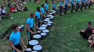 Boston Crusaders drum line in lot at semi finals in Indy 2025