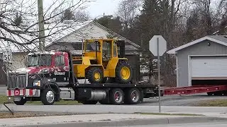At The Same Time Flat Bed Moves Fork Lift And Building
