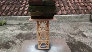Making a strong tower using popsicle sticks & testing it