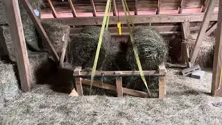 Stacking Mini Round Bales in a Hay Mow