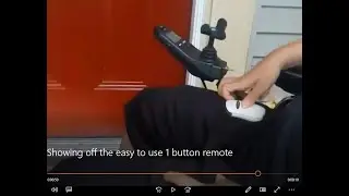 Showing off the easy to use 1 button remote