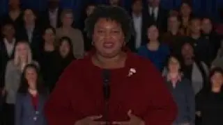 Democrat Abrams defends immigration, voting rights