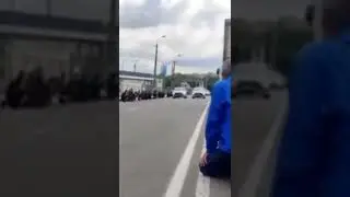 Everyone on their knees to show respect for the dead soldiere