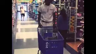 Wiz Kalifa shopping on a hoverboard